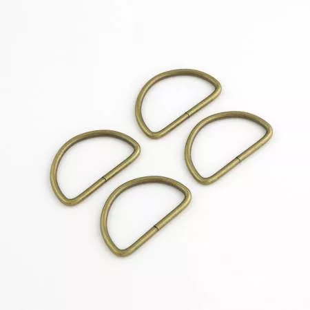 Four 2in D-Rings Antique